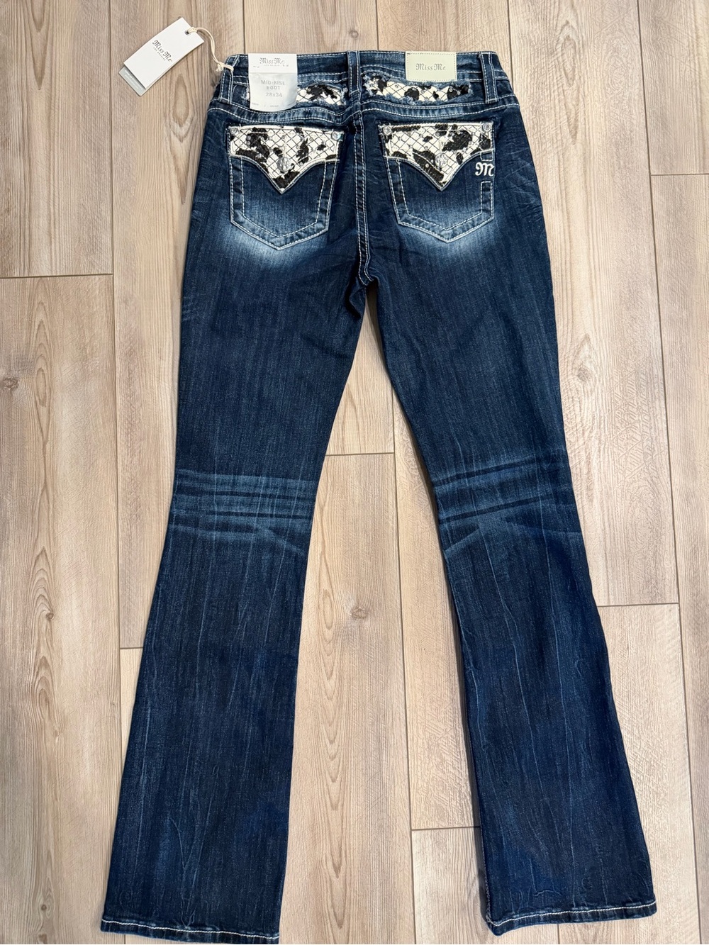 Miss Me Dark Blue Flare Jeans with Cow Print Back Pockets